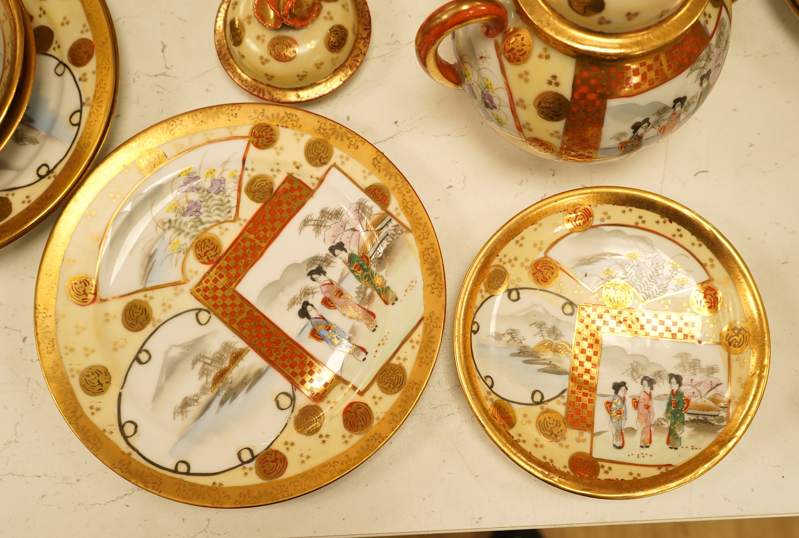 A Japanese Kutani eggshell nine cup part teaset